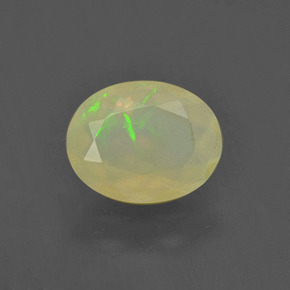 Ópalo multicolor natural de 0,93 ct, corte óvalo, translúcido