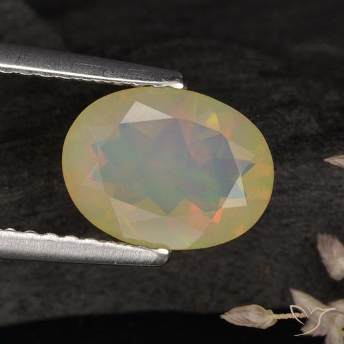 0.96ct Natural Multicolor Ópalo, Ovalada, Translúcido