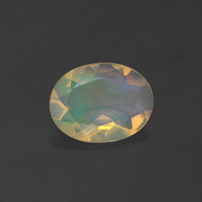 Ópalo multicolor natural de 0,83 ct, corte óvalo, transparente