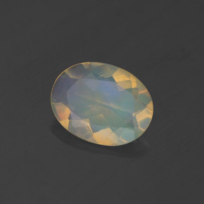Ópalo multicolor natural de 0,83 ct, corte óvalo, transparente