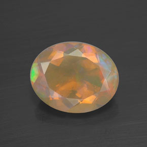 Ópalo multicolor natural de 1,73 ct, corte óvalo, transparente
