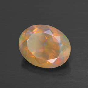 Ópalo multicolor natural de 1,73 ct, corte óvalo, transparente