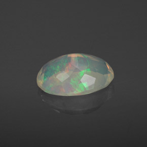 Ópalo multicolor natural de 1,92 ct, corte óvalo, transparente