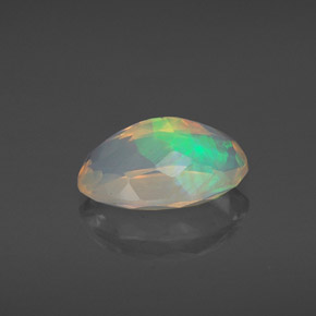 Ópalo multicolor natural de 1,77 ct, corte óvalo, transparente