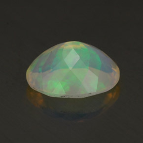 Ópalo multicolor natural de 1,50 ct, corte óvalo, transparente