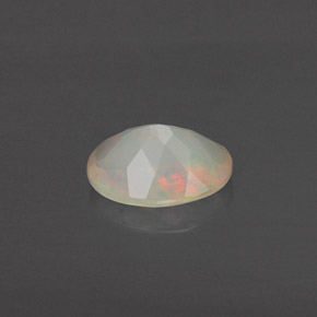 Ópalo multicolor natural de 0,63 ct, transparente, transparente / translúcido