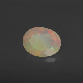 Ópalo multicolor natural de 0,63 ct, transparente, transparente / translúcido
