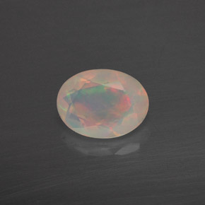 Ópalo multicolor natural de 0,83 ct, transparente, transparente / translúcido