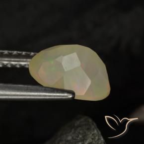 Ópalo Multicolor natural de 0.97 ct, Ovalada, Transparente / Translúcido