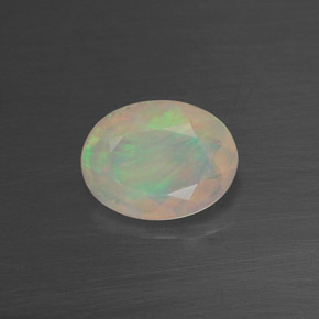 Ópalo multicolor natural de 0,65 ct, transparente, transparente / translúcido