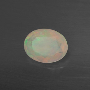 Ópalo multicolor natural de 0,65 ct, transparente, transparente / translúcido