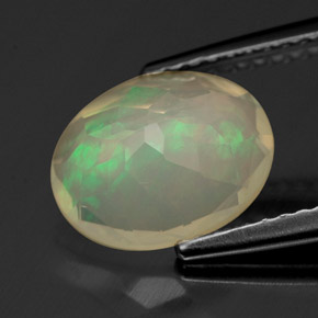 Ópalo multicolor natural de 1,60 ct, corte óvalo, transparente