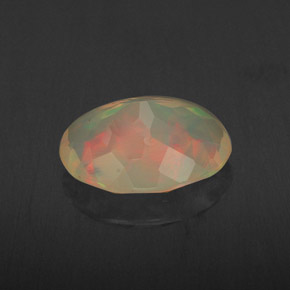 Ópalo multicolor natural de 1,65 ct, corte óvalo, transparente