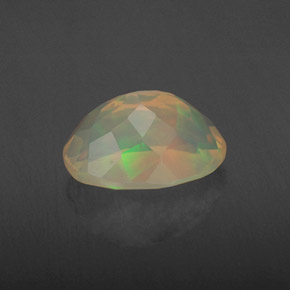 Ópalo multicolor natural de 1,88 ct, corte óvalo, transparente