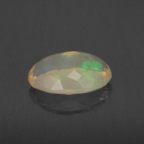 Ópalo multicolor natural de 1,72 ct, corte óvalo, transparente