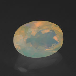 Ópalo multicolor natural de 1,96 ct, corte óvalo, transparente