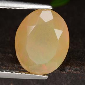 Ópalo amarillo natural de 2,07 ct, corte óvalo, translúcido