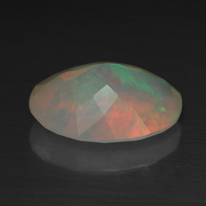 Ópalo multicolor natural de 1,74 ct, corte óvalo, transparente