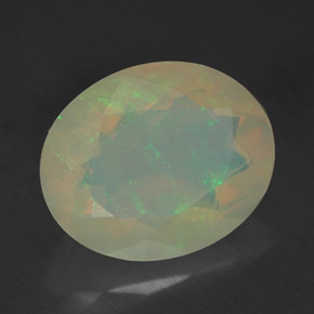 Ópalo multicolor natural de 2,09 ct, corte óvalo, transparente