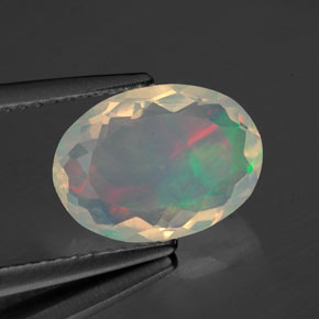 Ópalo multicolor natural de 1,54 ct, corte óvalo, transparente