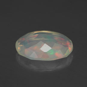 Ópalo multicolor natural de 1,54 ct, corte óvalo, transparente
