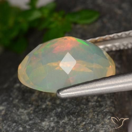 Ópalo Multicolor natural de 1.42 ct, Ovalada, Transparente