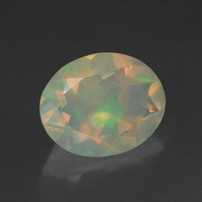Ópalo multicolor natural de 1,37 ct, corte óvalo, transparente