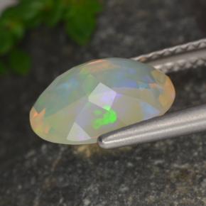 Ópalo multicolor natural de 1,29 ct, corte óvalo, transparente
