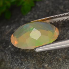 Ópalo multicolor natural de 1,30 ct, corte óvalo, transparente