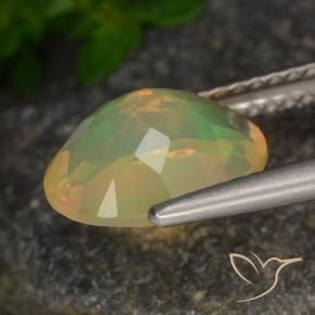 Ópalo Multicolor natural de 1.54 ct, Ovalada, Transparente