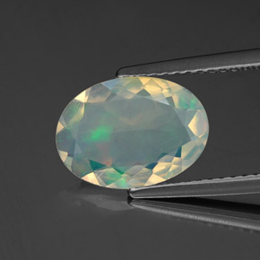 Ópalo multicolor natural de 1,53 ct, corte óvalo, transparente