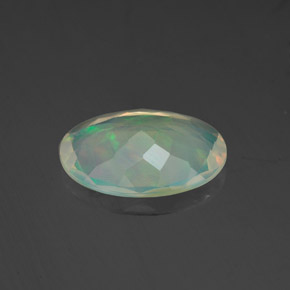 Ópalo multicolor natural de 1,53 ct, corte óvalo, transparente