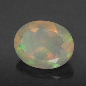 Ópalo multicolor natural de 1,59 ct, corte óvalo, transparente