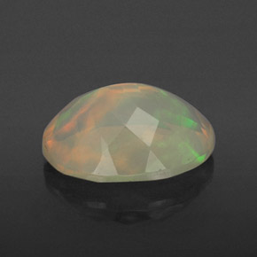 Ópalo multicolor natural de 1,59 ct, corte óvalo, transparente
