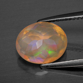 Ópalo multicolor natural de 1,64 ct, corte óvalo, transparente