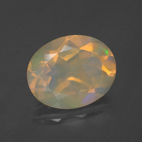 Ópalo multicolor natural de 1,63 ct, corte óvalo, transparente