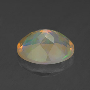 Ópalo multicolor natural de 1,63 ct, corte óvalo, transparente
