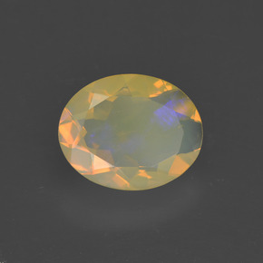 Ópalo multicolor natural de 1,31 ct, corte óvalo, transparente