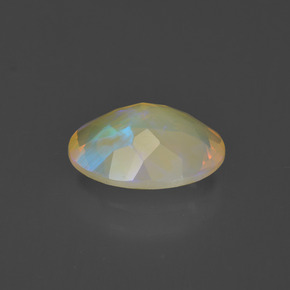 Ópalo multicolor natural de 1,31 ct, corte óvalo, transparente