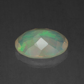 Ópalo multicolor natural de 1,19 ct, corte óvalo, transparente