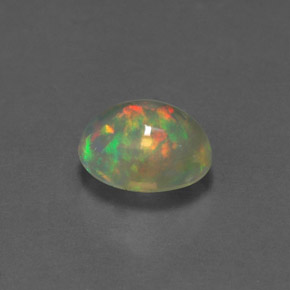 Ópalo multicolor natural de 1,11 ct, corte óvalo, transparente