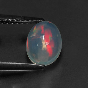 Ópalo multicolor natural de 1,01 ct, corte óvalo, transparente