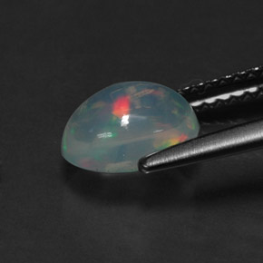 Ópalo multicolor natural de 1,01 ct, corte óvalo, transparente