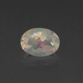 Ópalo multicolor natural de 0,62 ct, corte óvalo, transparente