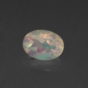 Ópalo multicolor natural de 0,62 ct, corte óvalo, transparente