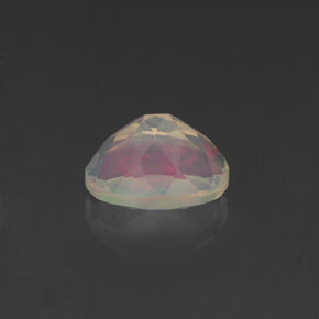 Ópalo multicolor natural de 0,62 ct, corte óvalo, transparente