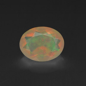 Ópalo multicolor natural de 0,99 ct, corte óvalo, transparente