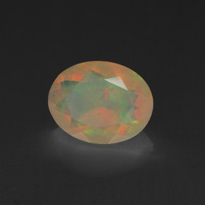 Ópalo multicolor natural de 0,99 ct, corte óvalo, transparente