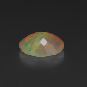 Ópalo multicolor natural de 0,99 ct, corte óvalo, transparente