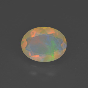 Ópalo multicolor natural de 1,02 ct, corte óvalo, transparente